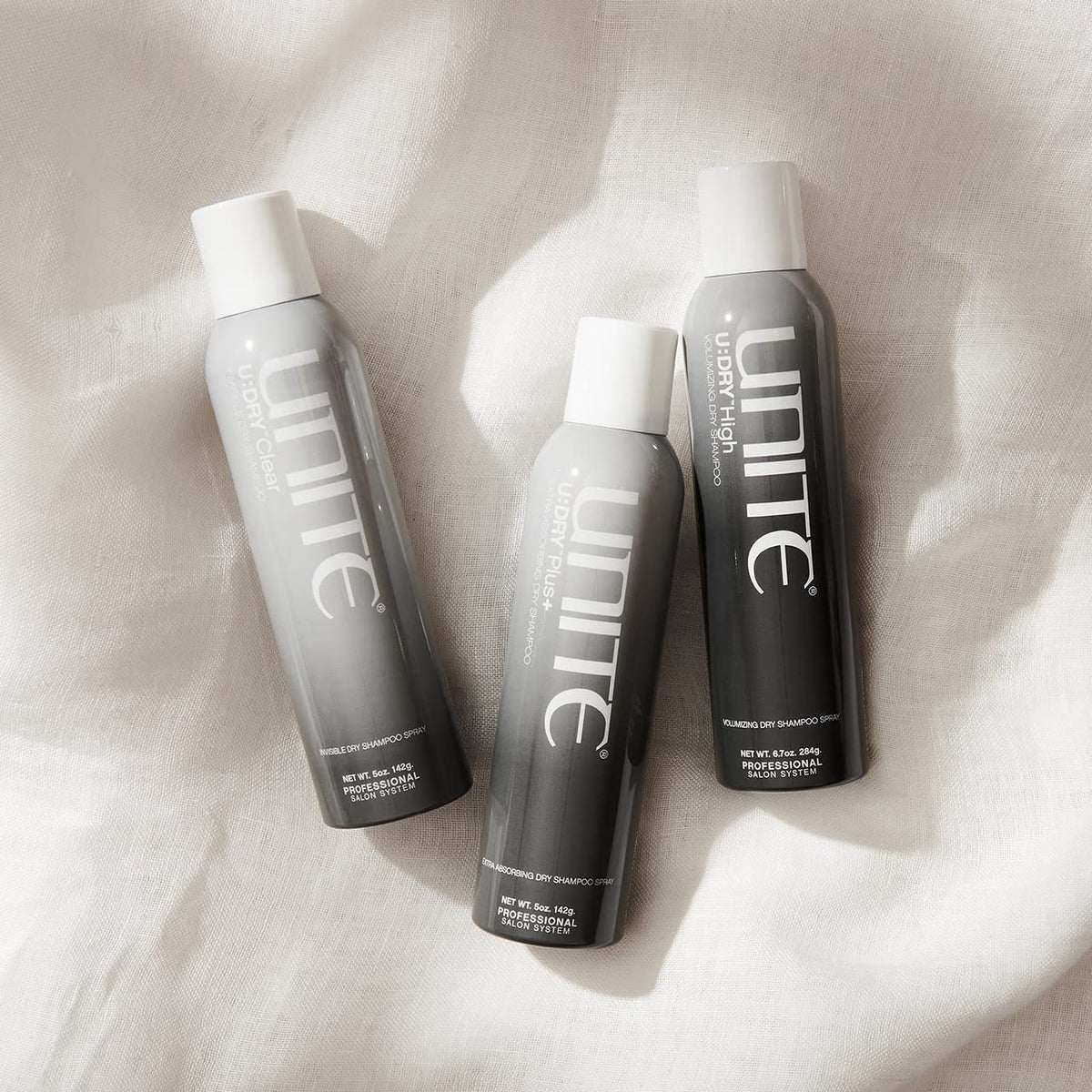 UNITE U:DRY High held in hand to show 6.7 oz size and travel convenience