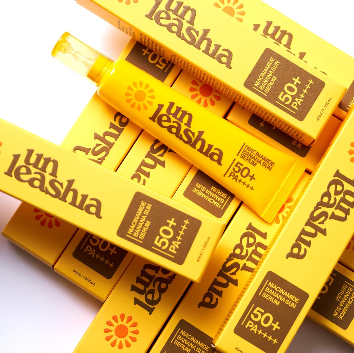 UNLEASHIA on bathroom counter with skincare items showing daily routine convenience benefit