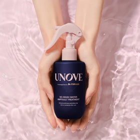 UNOVE bottle next to hand for size comparison, indicating convenient 200ml travel-friendly