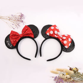 UNSPAZ headband worn at theme park demonstrating festive wearable sparkle