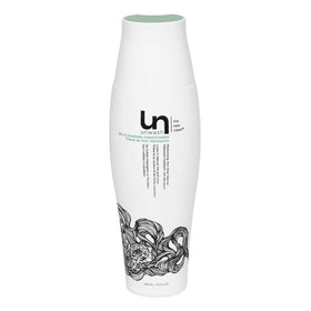 unwash front packaging showing 13.5 oz bottle and brand benefit