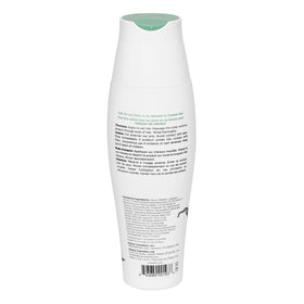 unwash used on curly hair in lifestyle setting showing enhanced bounce benefit
