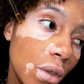 UpCircle oil texture on skin, illustrating lightweight absorption and hydrated finish