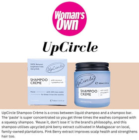 UpCircle jar beside coconut and pink berry visuals highlighting natural ingredients and ethics