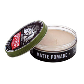 UPPERCUT DELUXE cream on fingers demonstrating smooth spreadability and control