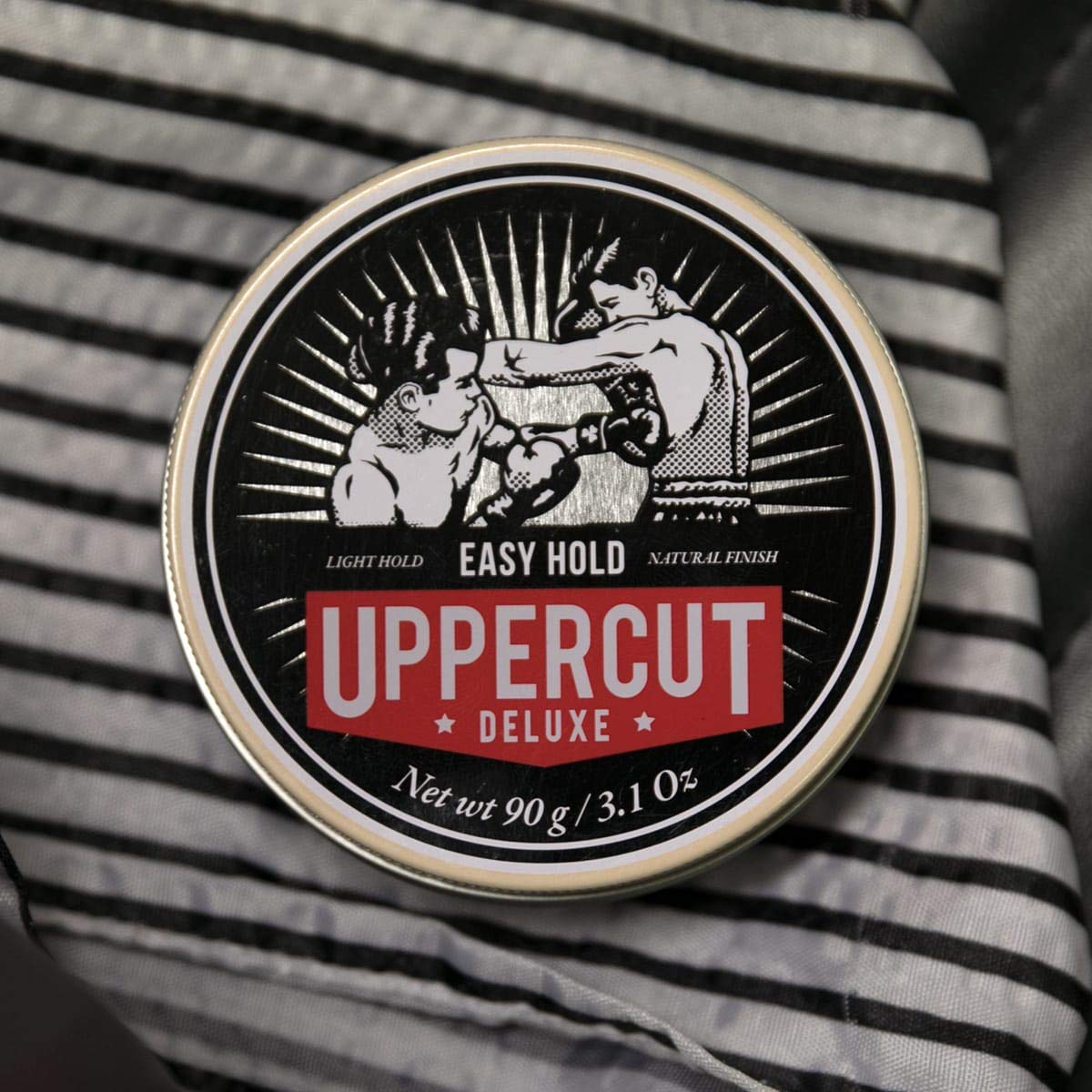 Uppercut Deluxe label close-up highlighting product name and matte finish