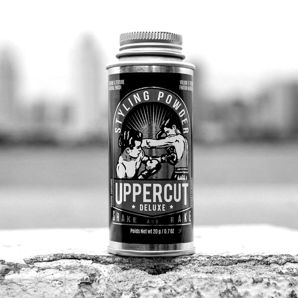 UPPERCUT DELUXE in hands textural view showing lightweight, mess-free product