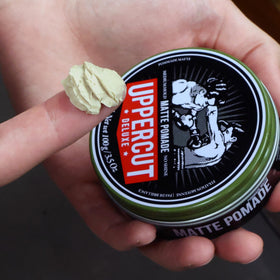 UPPERCUT DELUXE cream on palm demonstrating easy distribution and control