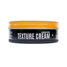 UPPERCUT DELUXE on bathroom shelf styled with other grooming items for routine benefit