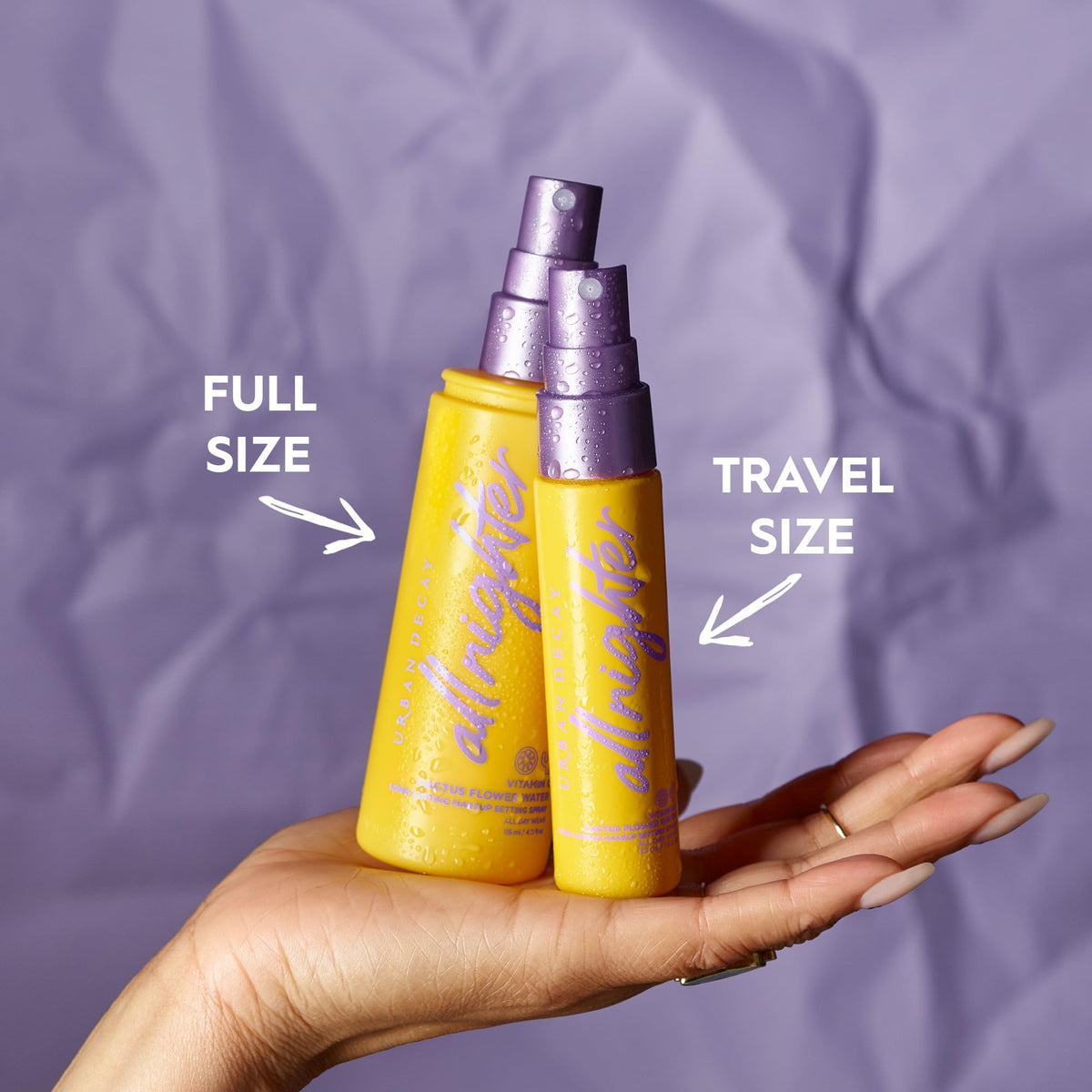 Urban Decay bottle on vanity with makeup items showing everyday routine benefit