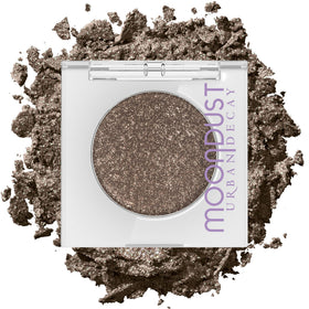 Urban Decay front packaging of Moondust glitter eyeshadow shows compact and label for easy identification