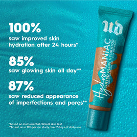 Urban Decay Hydromaniac application with fingers on cheek, shows blendable, natural finish