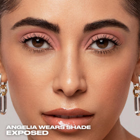 Urban Decay application on eyelid, displays crease‑proof smooth coverage