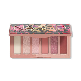 Urban Decay palette front view showing six blush-toned shades and compact benefit