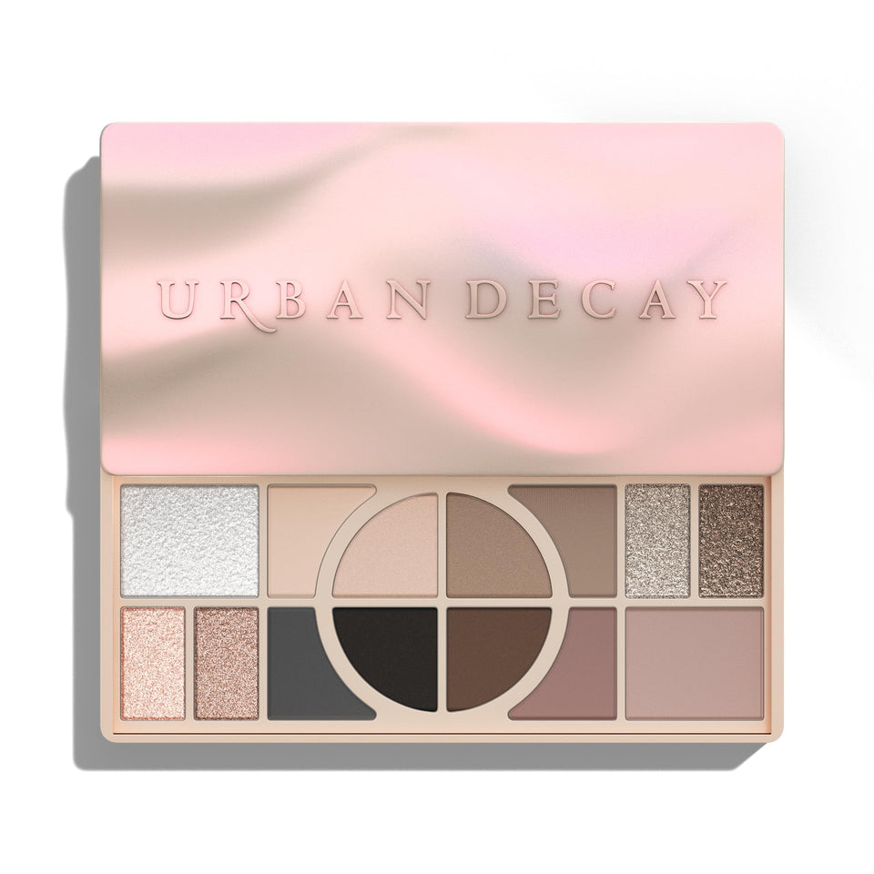 Urban Decay palette flatlay showing all pans and benefits