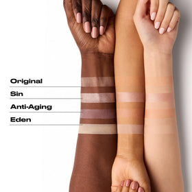 Urban Decay lifestyle model wearing Sin primer, brightens eyes and boosts shimmer