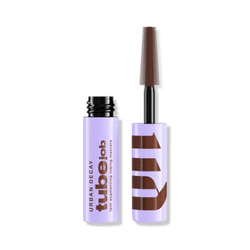 Urban Decay front packaging of Tube Job mini showing compact travel-friendly tube and label