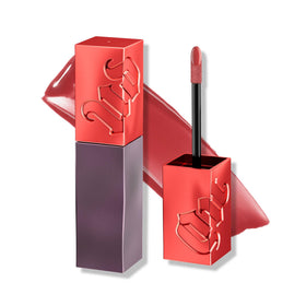 Urban Decay product front packaging showing PDA brick-red and glossy finish benefit