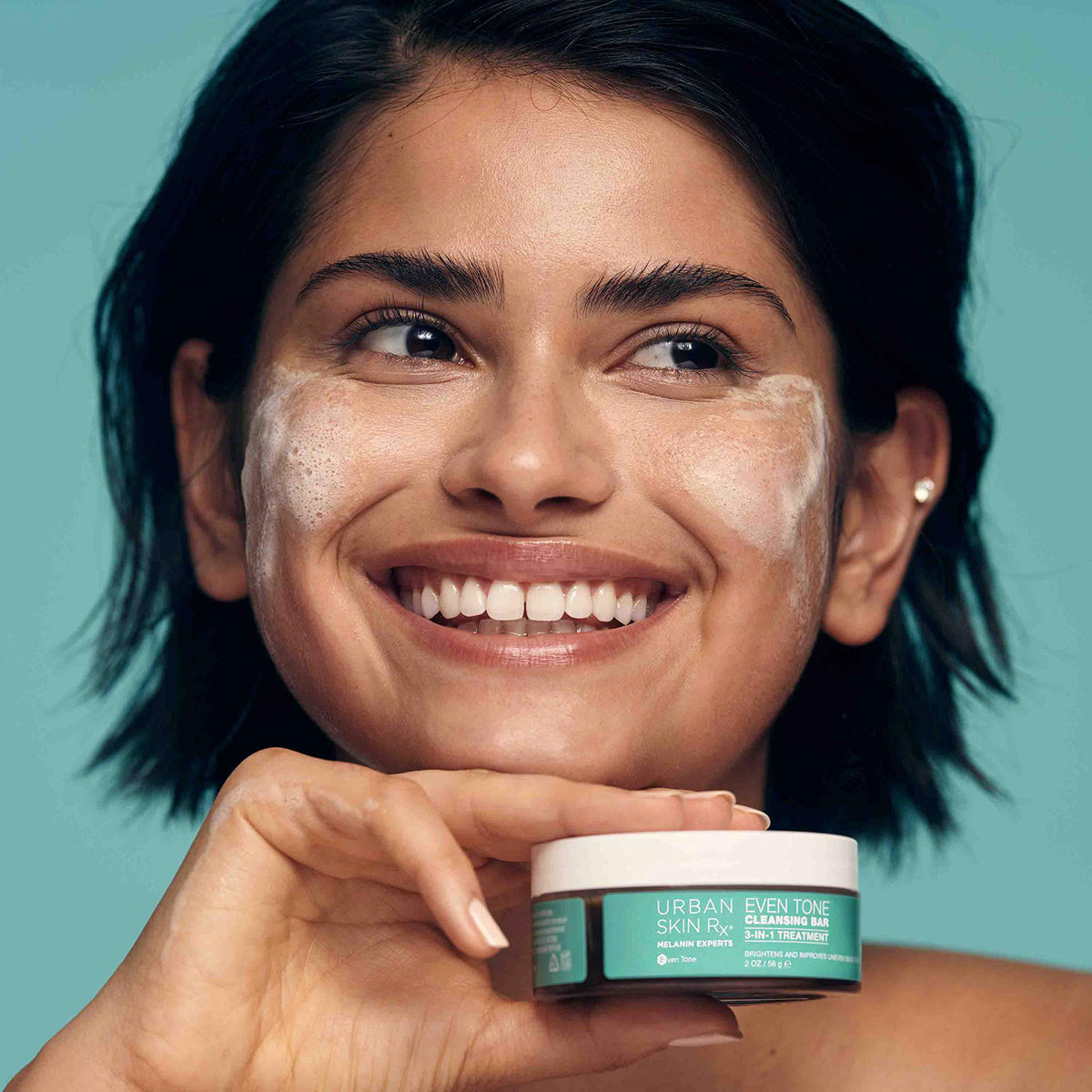 Urban Skin Rx bar resting on jar lid with sponge drying to preserve hygiene