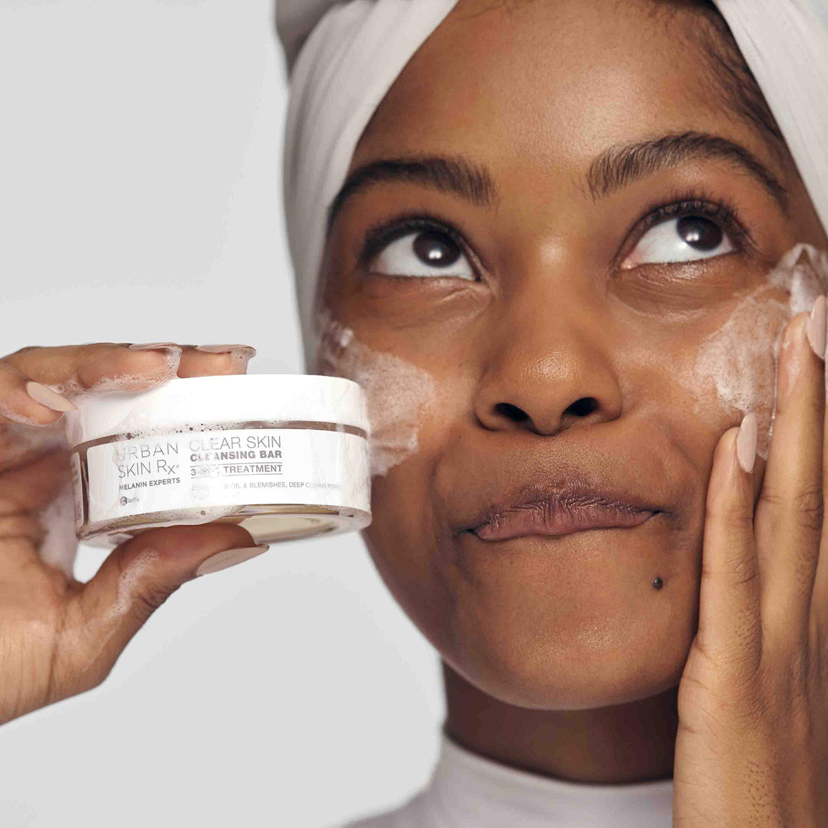 Urban Skin Rx cleansing bar rich foam lather demonstrating cleansing action