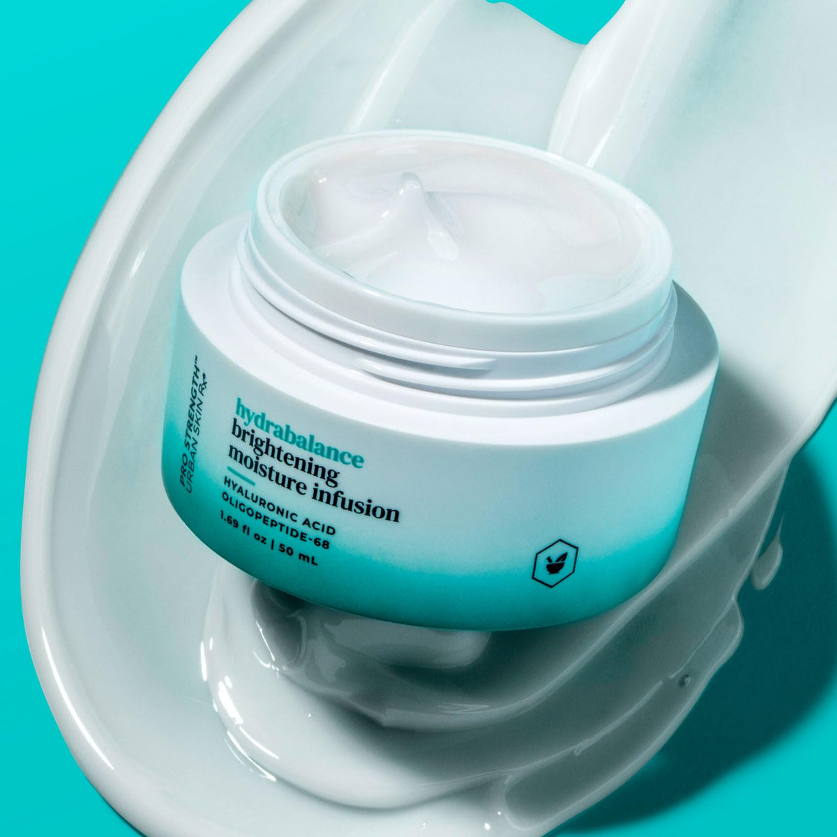 Urban Skin Rx moisturizer on hand demonstrating smooth, non-greasy finish
