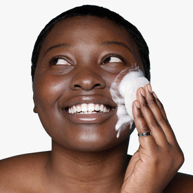 Urban Skin Rx bar lathered with sponge creating creamy foam that clarifies and refreshes skin