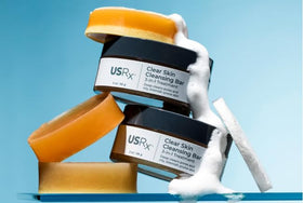 Urban Skin Rx foam applied as a short-contact mask on cheek demonstrating targeted treatment