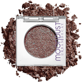 URBAN DECAY Solstice front pan showing red base and green sparkle for bold looks