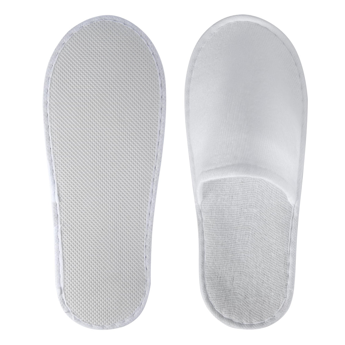 UrbanRoots slippers on hotel room floor conveying guest-ready comfort and professional presentation