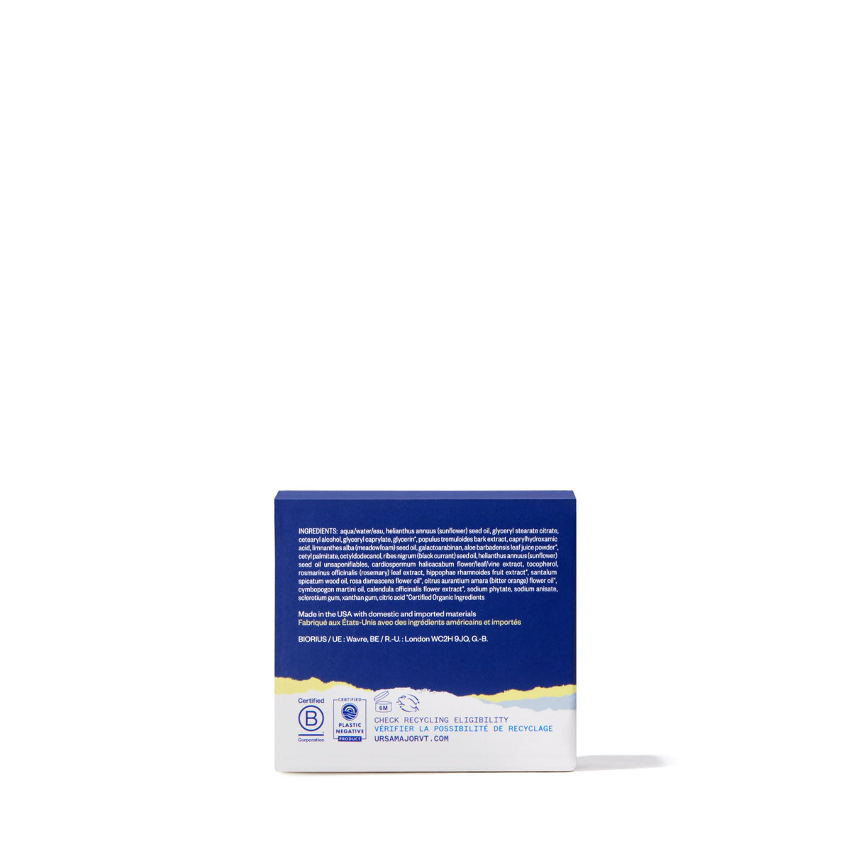 Ursa Major moisturizer next to ruler showing 1.57 oz size scale