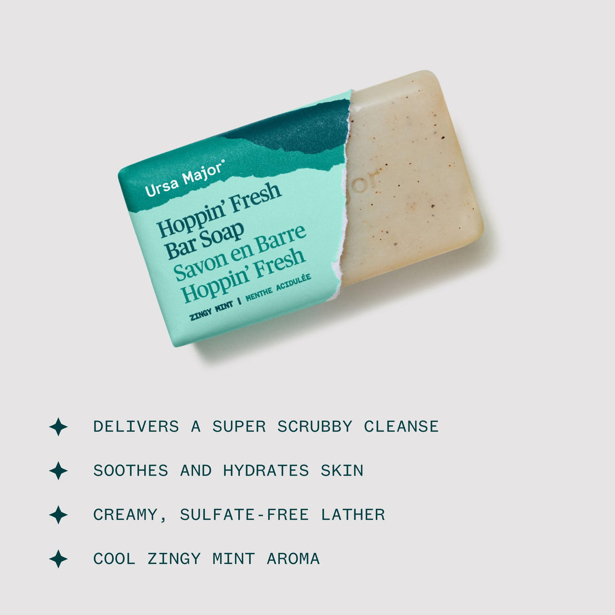 Ursa Major lather in hand demonstrating creamy foam and cleansing benefit