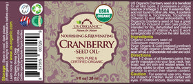US Organic cranberry seed oil glass eyedropper pouring precise drops for easy application