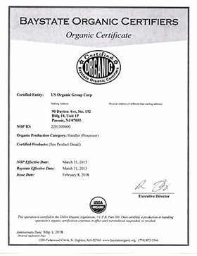 US Organic 10 ml bottle next to common items showing compact travel-friendly size