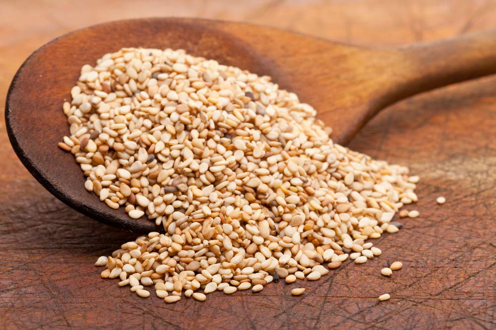 US Organic close-up untoasted sesame seeds showing clean sourcing benefit