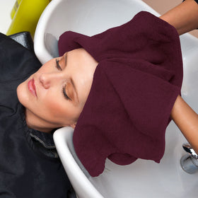 Utopia Towels care label close-up with washing guidance to preserve color
