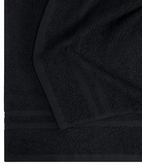 Utopia Towels used in gym holding weights demonstrating sweat control