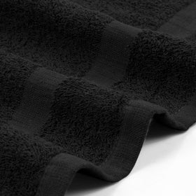 Utopia Towels wrapped around client shoulders in salon demonstrating protective coverage