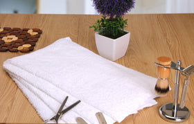 Utopia Towels in washing machine ready to launder for easy care