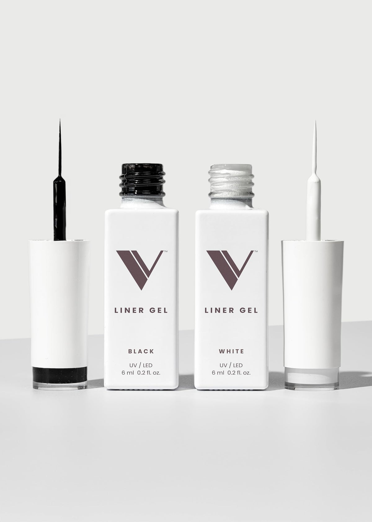 V Beauty Pure front packaging showing black and white liner duo and benefits