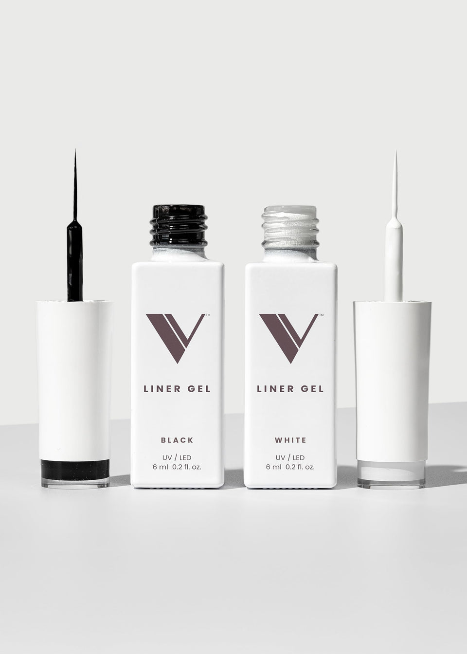 V Beauty Pure front packaging showing black and white liner duo and benefits