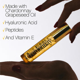 VACATION ingredients label showing grape seed oil and reef-friendly formulation