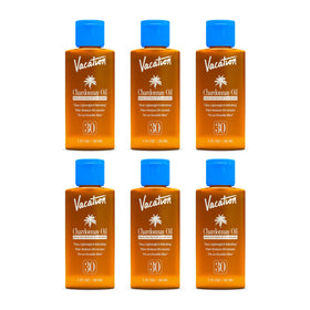 VACATION front packaging showing six travel-size bottles and elegant branding benefit portability