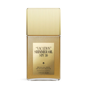 VACATION front bottle showing SPF 30 and shimmering oil benefits
