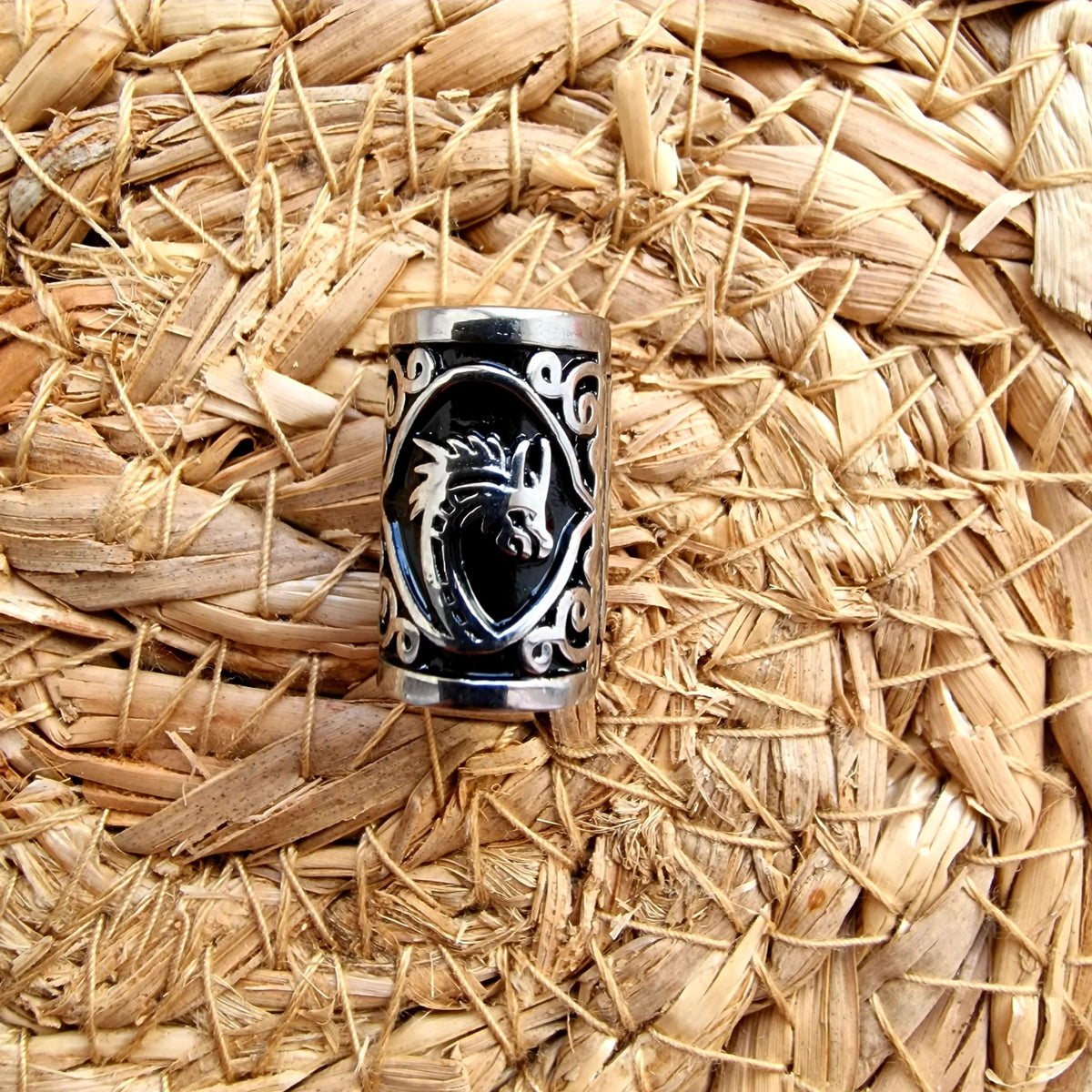 VALHALLA bead next to coin to show accurate 20x12mm scale benefit