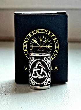 VALHALLA bead next to a ruler showing 8mm opening for sizing clarity and fit