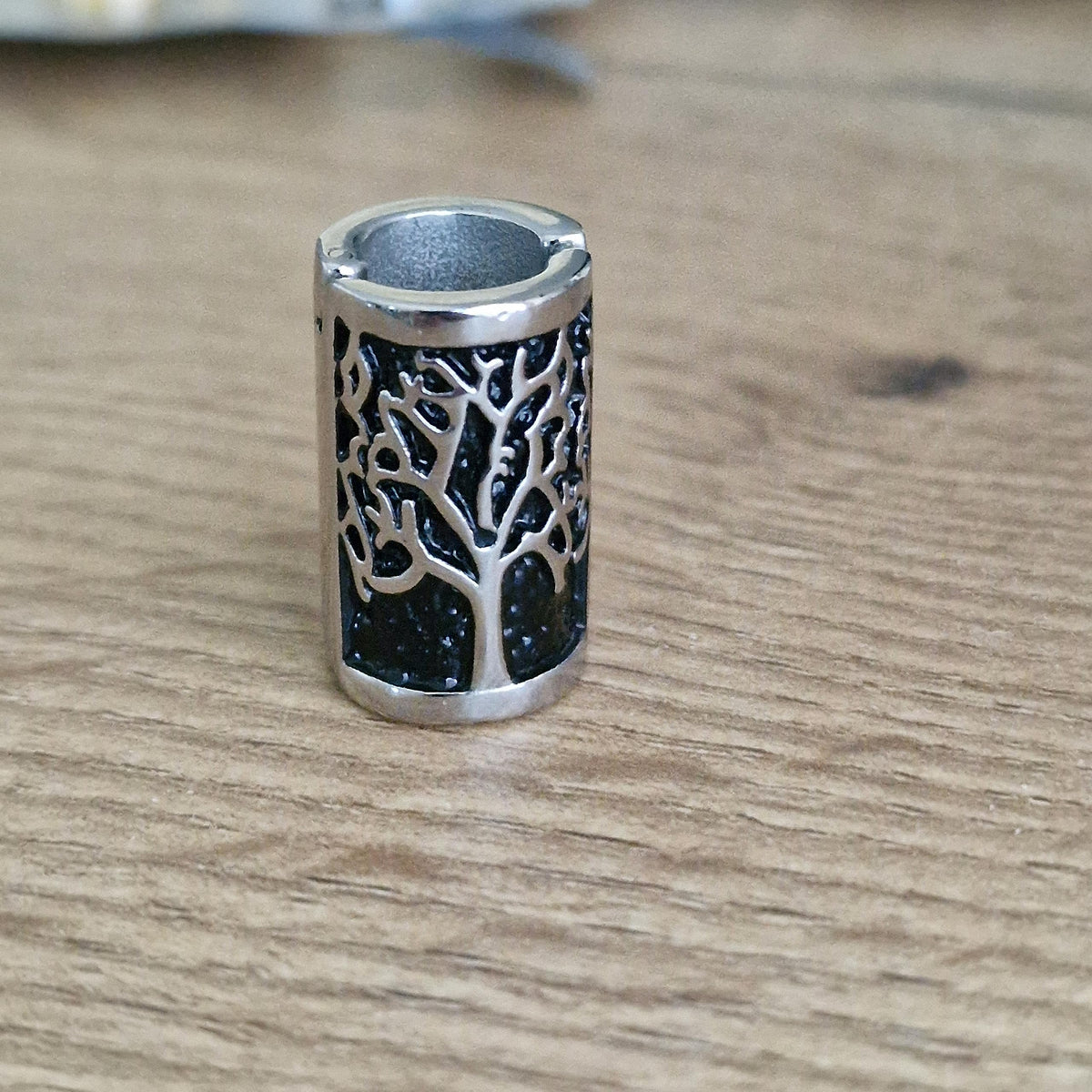 VALHALLA close-up of Tree of Life engraving highlighting detailed craftsmanship