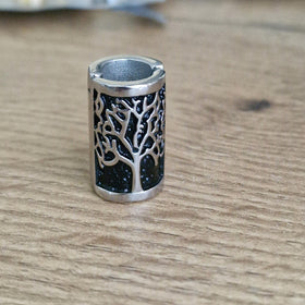 VALHALLA close-up of Tree of Life engraving highlighting detailed craftsmanship