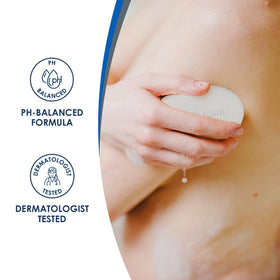 Vanicream cleansing bar in hand illustrating compact travel-friendly size