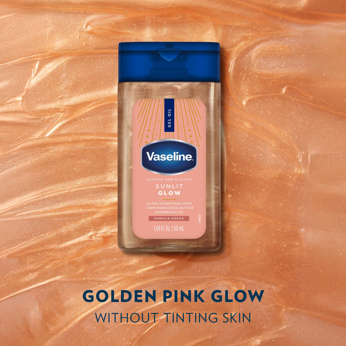 Vaseline bottle in hand for scale showing travel-size convenience