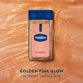 Vaseline bottle in hand for scale showing travel-size convenience